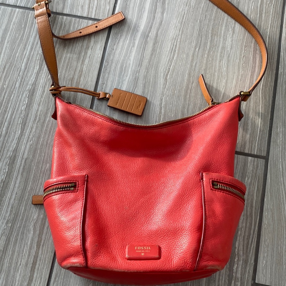 Fossil cross body bag coral red colour